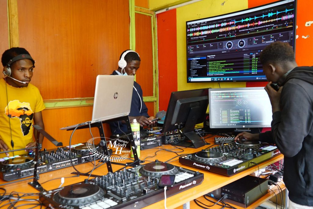 dj-school-nairobi Students practicing at Melody House, the best dj academy in Kenya with professional gear.